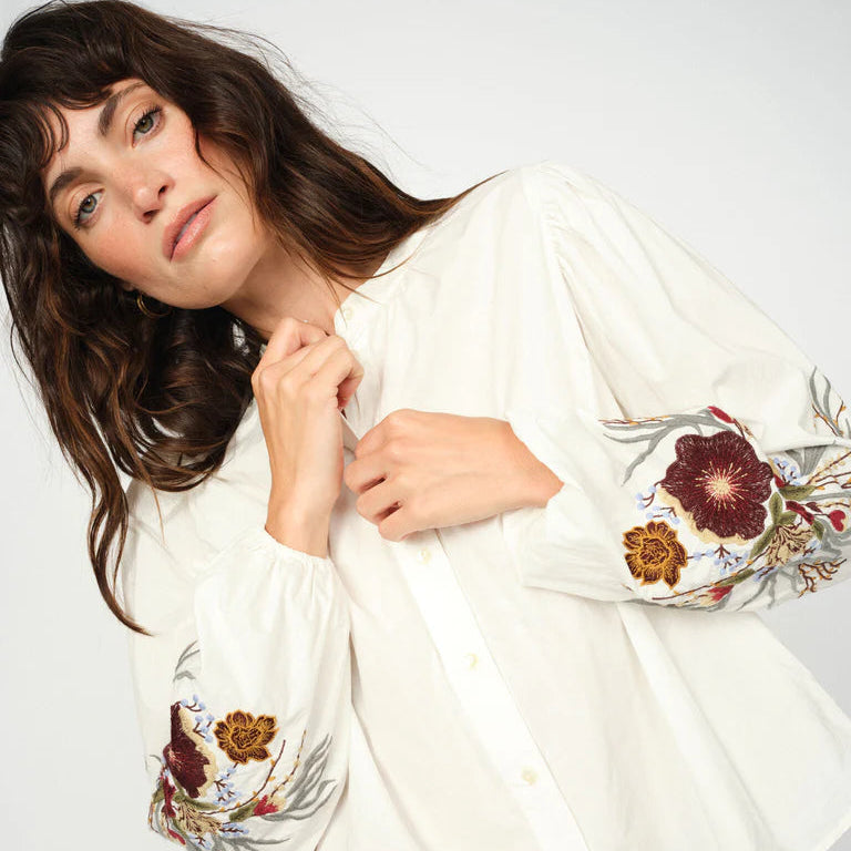 Women's apparel online showcasing a premium embroidered ethical fashion top